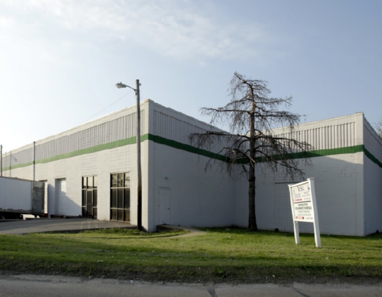 Exterior view of the warehouse at 130 Byassee Drive in Hazelwood, Missouri, acquired by Diamond Properties.