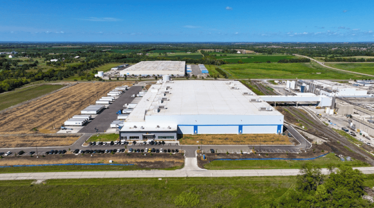 Exterior of the New Century Cold Storage warehouse in the Kansas City region, a fully leased refrigerated logistics facility.