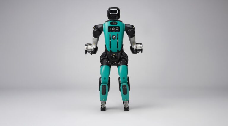 Agility Robotics Digit 5 humanoid robot in an industrial workspace.